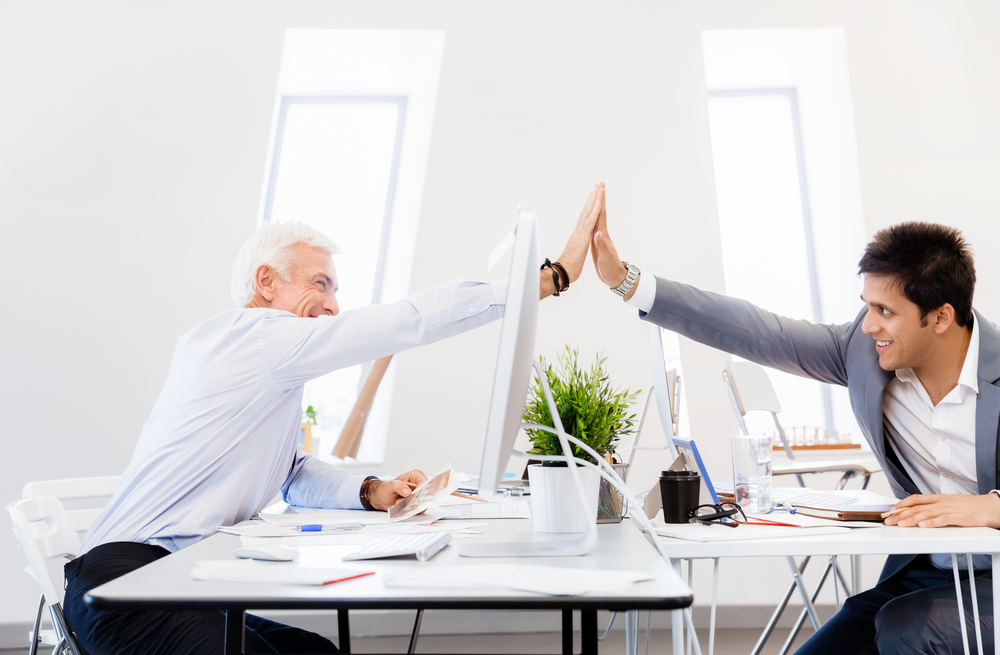 Businessmen,In,Office,Cheering,At,Their,Success